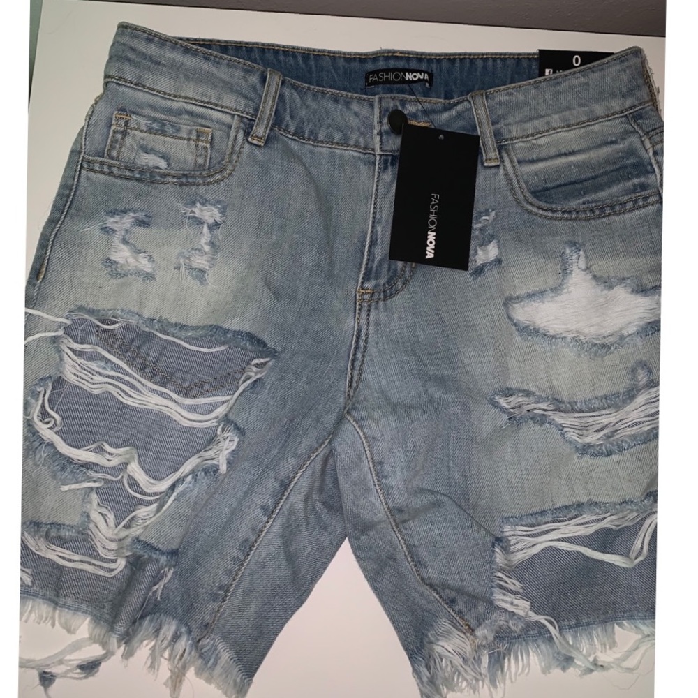 Distressed denim shorts